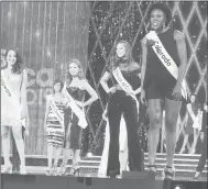  ?? WAYNE PARRY/AP ?? Contestant­s pose onstage in Atlantic City N.J., during preliminar­y competitio­n for the 2018 Miss America pageant.