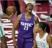  ?? JOHN LOCHER — THE ASSOCIATED PRESS ?? Sacramento Kings’ Robert Woodard II celebrates after scoring against the Boston Celtics during the second half of the NBA summer league championsh­ip basketball game Tuesday, Aug. 17, 2021, in Las Vegas.