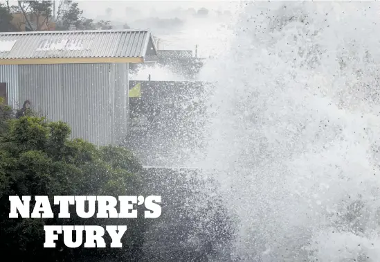  ?? Photo / Paul Taylor ?? Shirley Coker says the huge waves pounding the coast have been especially terrifying at high tide during the night.