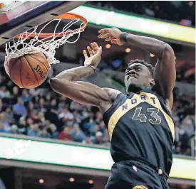  ?? [AP PHOTO] ?? Toronto forward Pascal Siakam dunks during the first half of Game 6 against the Washington Wizards, Friday in Washington.