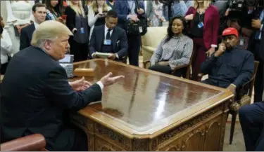  ?? EVAN VUCCI — THE ASSOCIATED PRESS ?? President Donald Trump meets with rapper Kanye West in the Oval Office of the White House, Thursday in Washington. At left is White House Senior Adviser Jared Kushner.