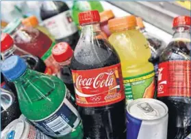  ??  ?? Sweet sour: Sugary soft drinks could cost consumers about 46c more but being healthier would be priceless. Photo: Shannon Stapleton/Reuters