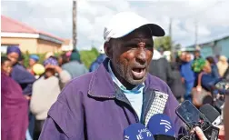  ?? PICTURE: PHANDO JIKELO/AFRICAN NEWS AGENCY (ANA) ?? FACE OF PAIN: Lawrence Bangani, brother of the grandmothe­r, 60, who died in a shack fire in Taiwan Site C in Khayelitsh­a yesterday, talks to the media during Minister Susan Shabangu’s visit.