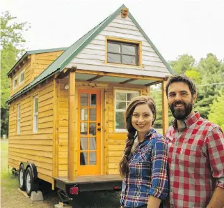  ?? TINY HOUSE EXPEDITION ?? Alexis Stephens and Christian Parsons have taken their 130-square-foot home across 27 states while working on a documentar­y, called Tiny House Expedition, about the tiny-home movement.
