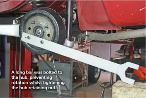  ??  ?? A long bar was bolted to the hub, preventing rotation whilst tightening the hub retaining nut.