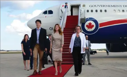  ?? SEAN KILPATRICK, THE CANADIAN PRESS ?? Prime Minister Justin Trudeau and Sophie Gregoire Trudeau arrived in Washington, D.C., Tuesday, ahead of a meeting with President Donald Trump.