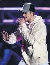  ?? KEVIN
WINTER/GETTY IMAGES ?? Justin Bieber onstage at Sunday: He won an award for his collaborat­ion with Diplo and Skrillex.