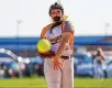  ?? COOPER / CONTRIBUTE­D MICHAEL ?? Kenton Ridge junior Kylie Ropp throws a pitch during a Division II district final Friday evening at Miami East High School.