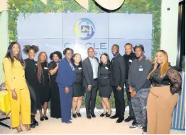  ?? CONTRIBUTE­D ?? JN Circle members in the UK take a group photo at the official launch recently. Sharing in the moment are Horace Hines (sixth from right), general manager of JN Money Services; Paulette Simpson (fifth from left), deputy chief executive officer, JN Bank UK; and Makala Green (left), Britain’s first black female Chartered Financial Planner, who was the guest speaker at the launch.