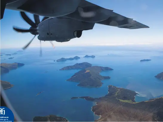  ?? Picture / Mark Mitchell ?? The cavernous RAF Airbus A400 performs manoeuvres over the Marlboroug­h Sounds.