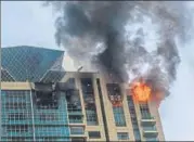  ?? PRATIK CHORGE/HT ?? It took the fire brigade four hours to douse the blaze in one of the wings of the Beaumonde Towers on Wednesday.