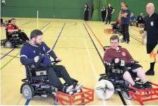  ??  ?? Fast and furious Powerchair football is a growing sport