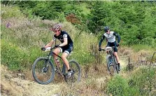  ??  ?? Palmerston North’s Max Taylor, right, is part of the Mountain Bike National Performanc­e Hub squad for 2018.