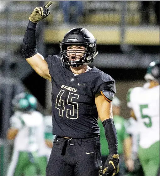  ?? File photo/Special to NWA Democrat-Gazette/DAVID BEACH ?? Bentonvill­e’s Keegan Stinesprin­g celebrates Oct. 4 during a game against Van Buren at Tiger Stadium in Bentonvill­e. The Tigers have a bye in the first-round of the Class 7A state playoffs.