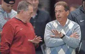  ?? MICKEY WELSH/ADVERTISER ?? New England Patriots head coach Bill Belichick chats with Alabama head coach Nick Saban during Pro Day on the University of Alabama campus in Tuscaloosa, Ala., on March 19, 2019.