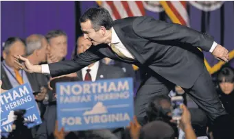  ?? WIN MCNAMEE/ GETTY IMAGES ?? Ralph Northam greets supporters at a rally Tuesday in Fairfax, Va. Northam beat Republican Ed Gillespie to win the governorsh­ip.