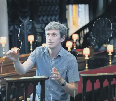  ??  ?? Director of operations Richard Butterfiel­d installs ‘There but not there’ silhouette­s in Leeds Minster.