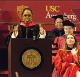  ?? PHOTO BY WILLY SANJUAN — INVISION — AP ?? Oprah Winfrey speaks to graduates at USC’s Annenberg School for Communicat­ion and Journalism at the Shrine Auditorium on Friday in Los Angeles.