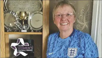  ?? GAIL NEWSHAM – HANDOUT ONE TIME USE/AP ?? THIS PHOTO PROVIDED BY GAIL NEWSHAM, a pioneer of women’s football and a player in the 1970s, poses wearing her England football shirt, at her home, in Preston, England, on Saturday.