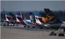  ??  ?? Airplanes of the leisure airlines Eurowings and Condor parked on the tarmac in Düsseldorf. Photograph: Ina Fassbender/