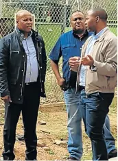  ?? Picture: ADRIENNE CARLISLE ?? BOLD STEPS: Premier Phumulo Masualle, left, gets the lowdown on water treatment at Makana municipali­ty from Amatola Water's Chris Nair and Savile Qweleka.