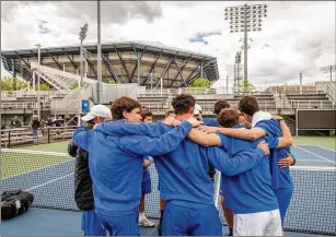  ?? PHOTOS BY JOHNNY MILANO/NEW YORK TIMES ?? St. Francis of Brooklyn players huddle at the NCAA Tournament at USTA Billie Jean King National Tennis Center in Queens Friday. “Just to hear it, it was definitely a gut punch,” the coach said of news the athletic program would be no more.