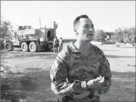  ?? AP/KHALID MOHAMMED ?? U.S. Army Lt. Col. James Browning speaks Thursday during an interview with The Associated Press on a joint base with the Iraqi army south of Mosul, Iraq.