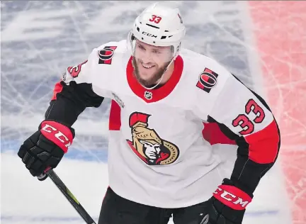  ?? ERIK SIMANDER/THE ASSOCIATED PRESS ?? Fredrik Claesson, one of three Swedish-born players on the Senators, celebrates a goal Friday in Stockholm.