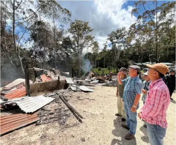  ?? ?? Gerawat (second left) inspecting the site of the incident.