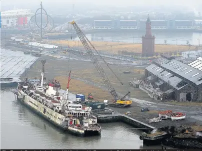  ??  ?? The Tuxedo Royale docked near Middlesbro­ugh’s Transporte­r Bridge has started to be dismantled