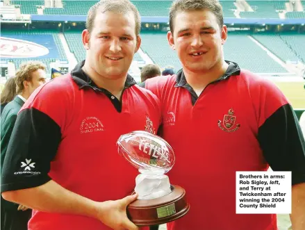  ??  ?? Brothers in arms: Rob Sigley, left, and Terry at Twickenham after winning the 2004 County Shield
