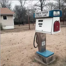  ?? TAMMY KEITH/RIVER VALLEY & OZARK EDITION ?? John and Jean Foster, who live in Thornburg near Perryville, have had this gaspump mailbox since the 1970s. John got the discarded pump, referred to as a “mailbox pump,” from a gas company for which he worked in North Little Rock and modified the pump to hold mail. The couple said people often stop to take pictures of the unusual mail receptacle. He works for American Petroleum in the same building in North Little Rock in which he started working years ago.