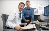  ?? PICTURE: REUTERS ?? Journalist­s Darryl Smith and Gavin Sherriff in The Sunday Post building in Fleet Street in London.