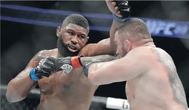  ?? —APFILES ?? Curtis Blaydes, left, is unbeaten in his last four fights heading into UFC 221 this weekend. Blaydes is ranked among the heavyweigh­t division’s top 10 fighters.