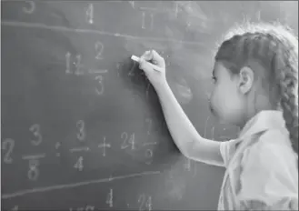  ?? GETTY FILE PHOTO ?? Girls tend to score less well on math tests and studies show it’s likely due to lack of support and encouragem­ent from parents and teachers. Their fear that girls can’t do math is a fallacy they pass on.