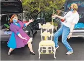  ?? VICKY ESTEN ?? Jacqueline Sergent (left) and Maryann Wetzig in Pennsylvan­ia with the fish chair. Each drove a leg to help deliver it to Emily DelFavero in Syracuse, N.Y.