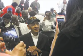  ?? Mark Thiessen / Associated Press ?? Veteran Leonard Larkins celebrates the 75th anniversar­y of the Alaska Highway in Anchorage. The work of 4,000 black soldiers on the road became a factor in the integratio­n of the Army.