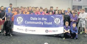  ??  ?? ●●Rochdale FC star Calvin Andrew at the launch of the Premier League Kicks coaching programme at the Soccer Factory in Castleton