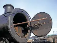  ?? ROGER MOLESWORTH ?? One of the tubes being removed from the boiler of GWR ‘28XX’ 2-8-0 No. 2807 at Toddington on January 18.