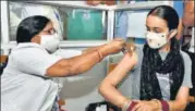  ??  ?? A woman gets inoculated against Covid, in Bikaner on Sunday.