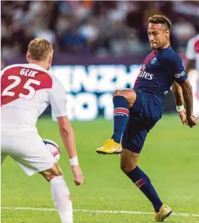  ?? EPA PIC ?? PSG’s Neymar (right) tries to get past Monaco’s Kamil Glikmatch in a French Champions Trophy match in Shenzhen, China on Saturday.