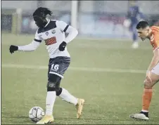  ?? Pic: Kieron Louloudis ?? CLOSE CONTROL Daniel Ajakaiye on the ball during Hawks’ FA Trophy win against Braintree