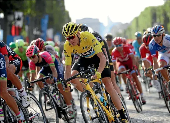  ?? PHOTO: GETTY IMAGES ?? Chris Froome held on to win his third Tour de France.