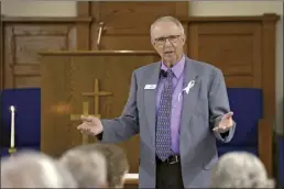  ?? AP photo ?? Rev. Bill Farmer preaches to his congregati­on at the Grace Methodist Church on May 14 in Homosassa Springs, Fla. Farmer came out of retirement to serve as the church’s pastor. The group’s previous congregati­on “was a good church,” Farmer said, and he wished it well. But “my struggle was with the United Methodist structure, what’s going on with the United States, particular­ly.”