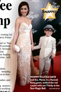  ?? RICHARD REYES ?? MOMMY’S LITTLE DATE Jodi Sta. Maria, in a Hannah Kong gown, walked the red carpet with son Thirdy at the Star Magic Ball.