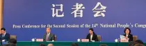  ?? CONTRIBUTE­D PHOTO ?? Chinese Foreign Minister Wang Yi (2nd from left) at the press conference of the second session of the 14th National Committee of the Chinese People’s Political Consultati­ve Conference.