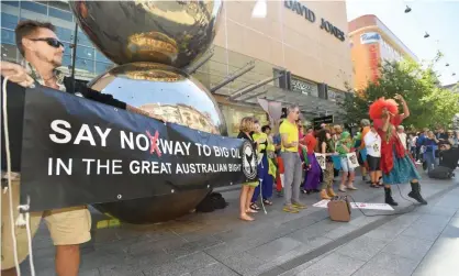  ??  ?? Stop Shopping Gospel Choir from New York in Adelaide’s Rundle Mall in March protest against Norwegian oil giant Equinor’s plans to drill in the Great Australian Bight. Photograph: David Mariuz/AAP