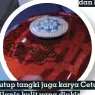  ??  ?? Tutup tangki juga karya Cetul, dilapis kulit yang diukir