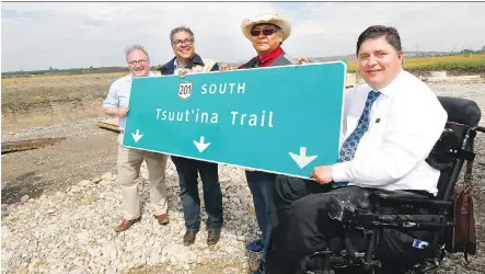  ?? DARREN MAKOWICHUK ?? From left, Infrastruc­ture and Transporta­tion Minister Brian Mason, Mayor Naheed Nenshi, Chief Lee Crowchild of the Tsuut’ina Nation and federal Veterans Affairs Minister Kent Hehr officially commemorat­e the constructi­on and renaming of part of the Calgary Ring Road.