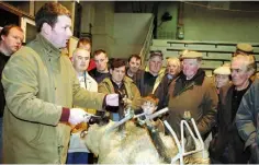  ??  ?? Pat Clarke demonstrat­es how to pare a ewe’s hoof at a Teagasc Sheep Demonstrat­ion in Kilkenny Mart.